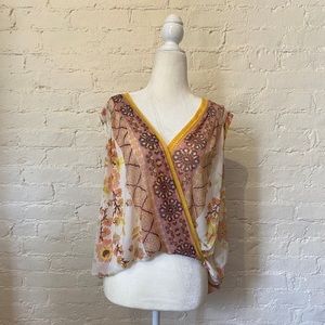 Free People faux wrap sleeveless top, sz M, Nylon and Spandex. Snap closure at V